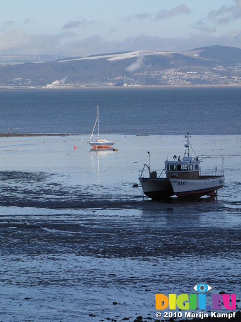 SX11908 Beached sailboat and catamaran